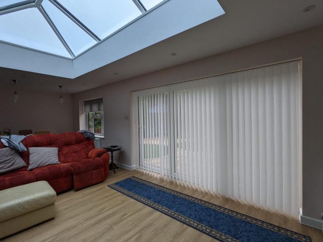 Allusion Blinds on large window in living space